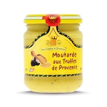 L'image montre un pot de moutarde de la marque "Les Comtes de Provence". Le pot est étiqueté "Moutarde aux Truffes de Provence". L'étiquette est jaune avec des détails noirs et rouges, et présente une illustration de graines de moutarde et de truffes. Le haut du pot est scellé avec un sceau rouge portant les initiales "CP". En bas à gauche de l'étiquette, il est écrit "Cuisiné en France".
